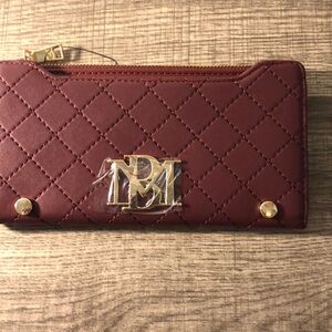 Badgley Mischka Vegan Leather Long Cards Wallet in the color wine.